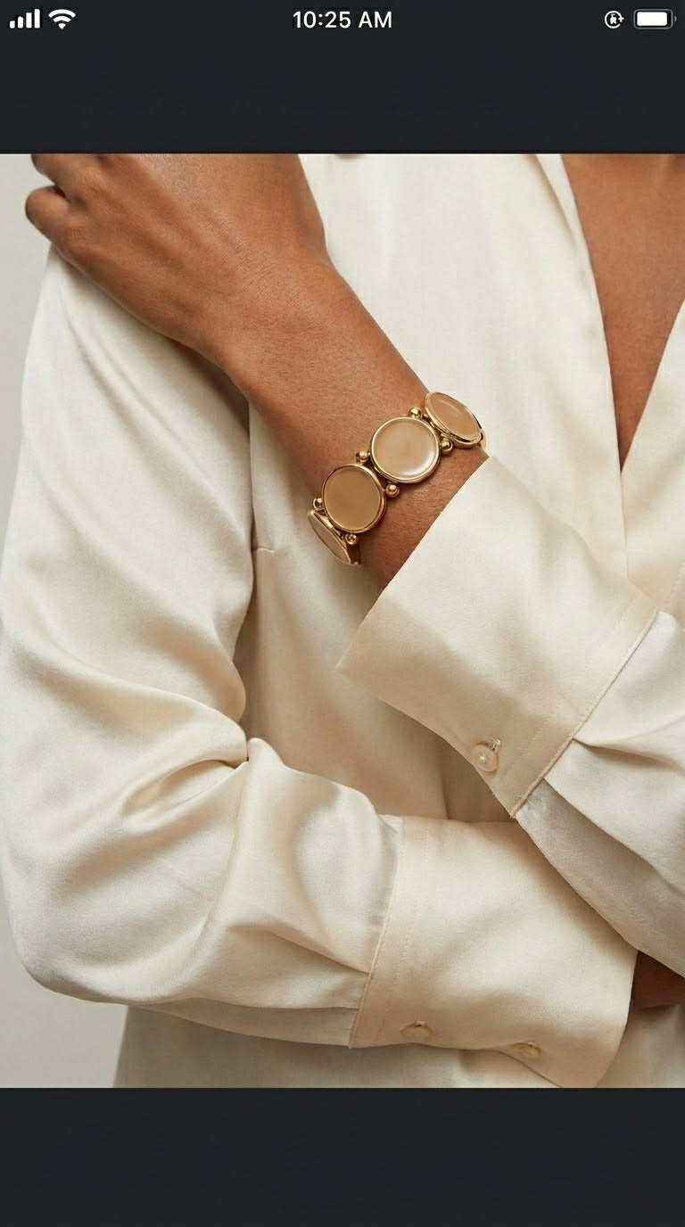 Elastic bracelet in round circles with color camel surrounded with gold plating 