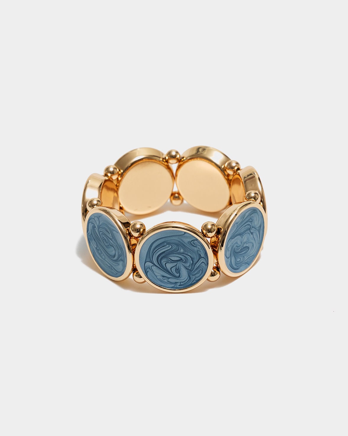 Elastiskt armband med runda plattor som har en guldkant i Blue