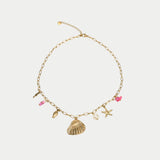 A gold plated necklace with hanging charms