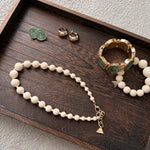 Dark Wood Tray with jewelries