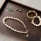 Dark Wood Tray with jewelries