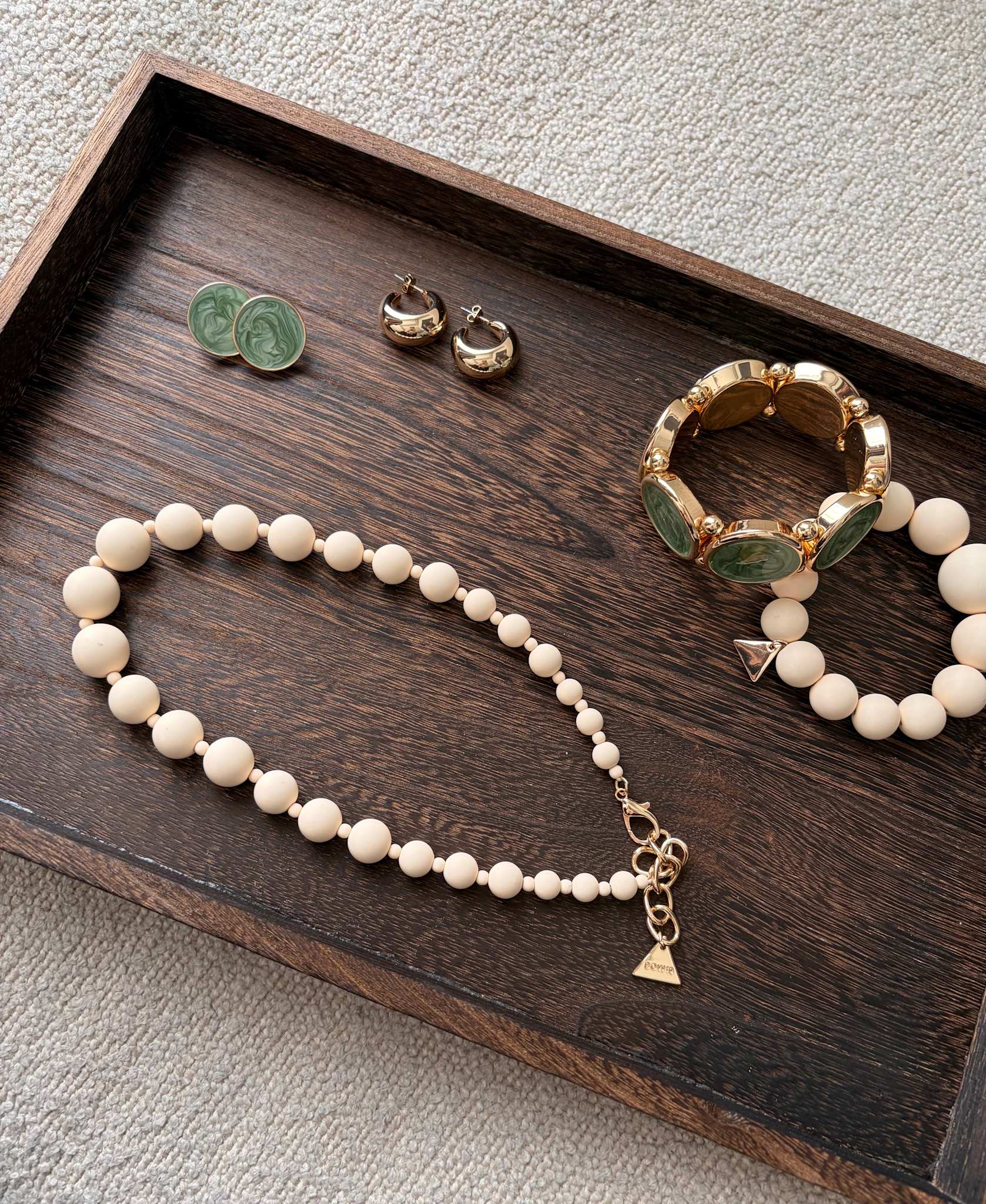 Dark Wood Tray with jewelries